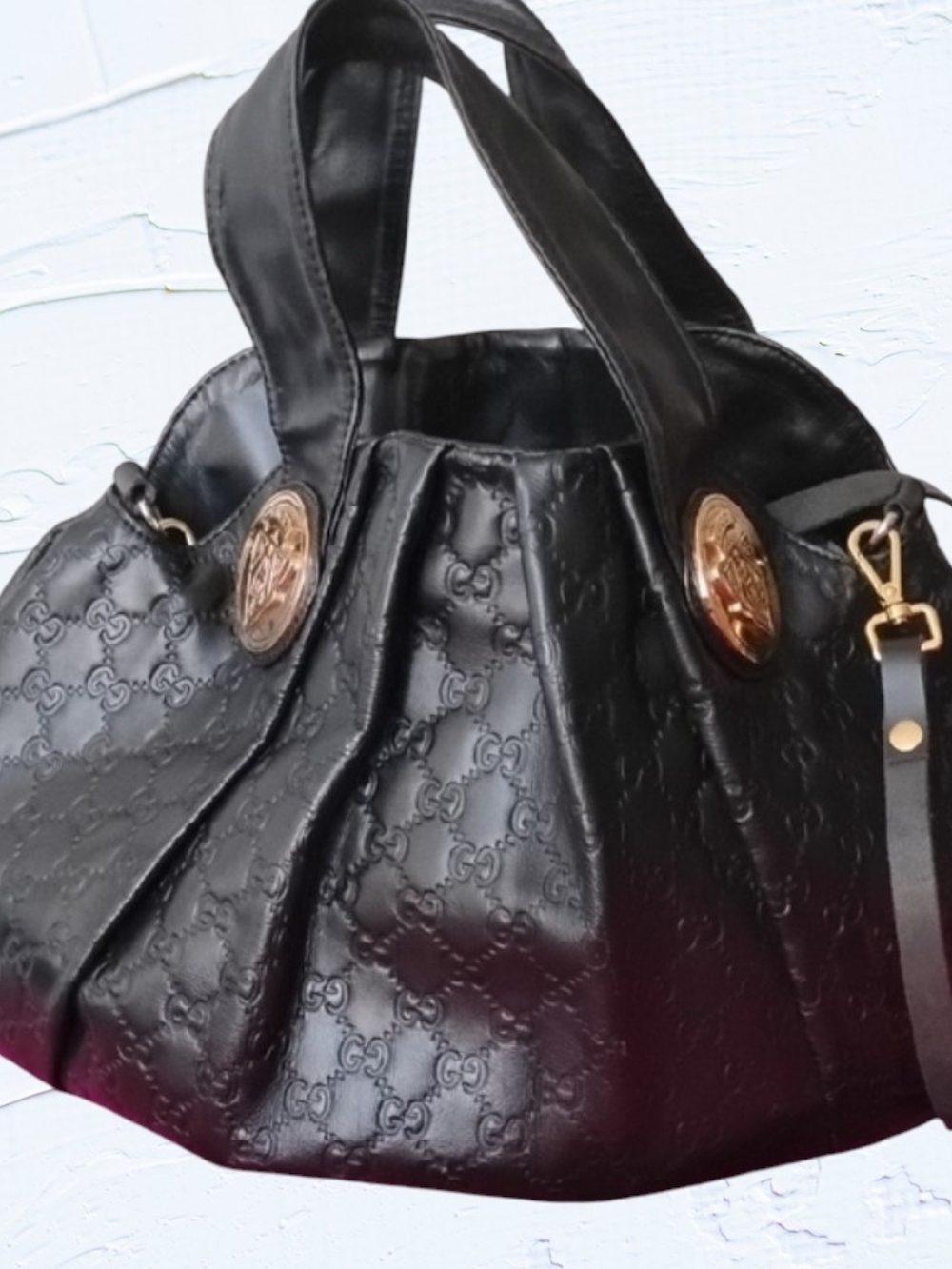 Gucci Black Embossed Leather Hobo with Gold-Tone Crest Medallions, Authentic.